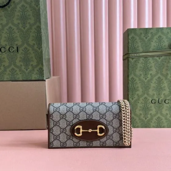 Gucci 1955 GG Supreme canvas with brown leather shoulder
