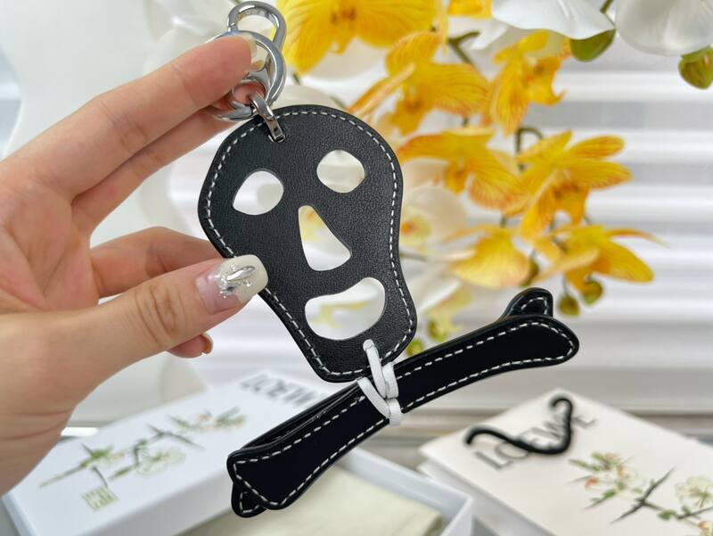Loewe Skull and Bones keychain Black leather White leather keychain — Top Quality Replica