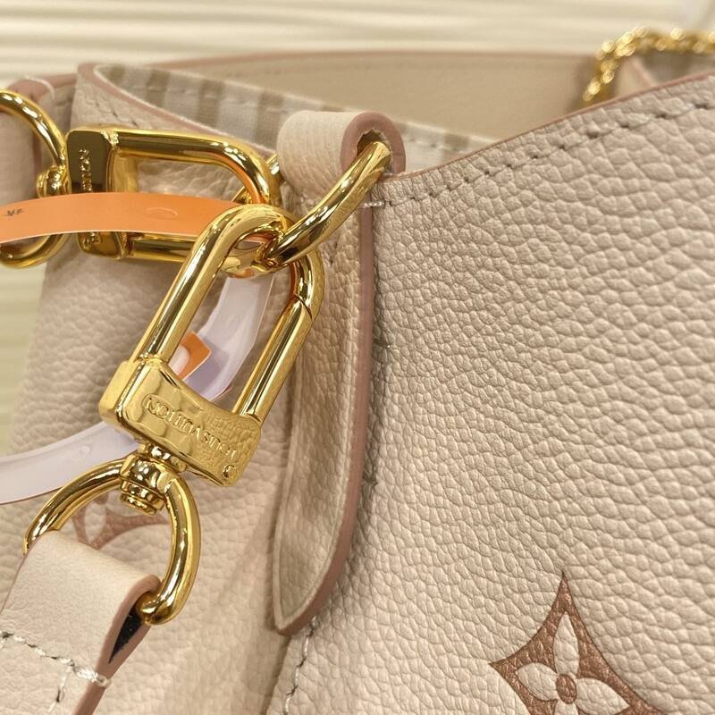 Louis Vuitton N oNo Cream Monogram Empreinte crossbody — Premium Replica