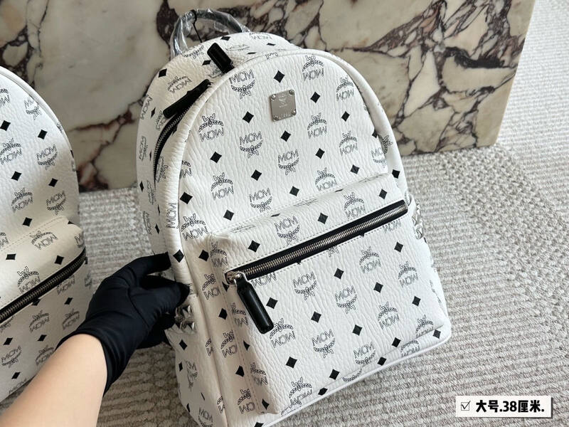 MCM Stark White Visetos backpack — Top Quality Replica