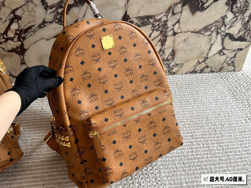 MCM Stark Cognac Visetos (small) backpack — AAA Quality Replica
