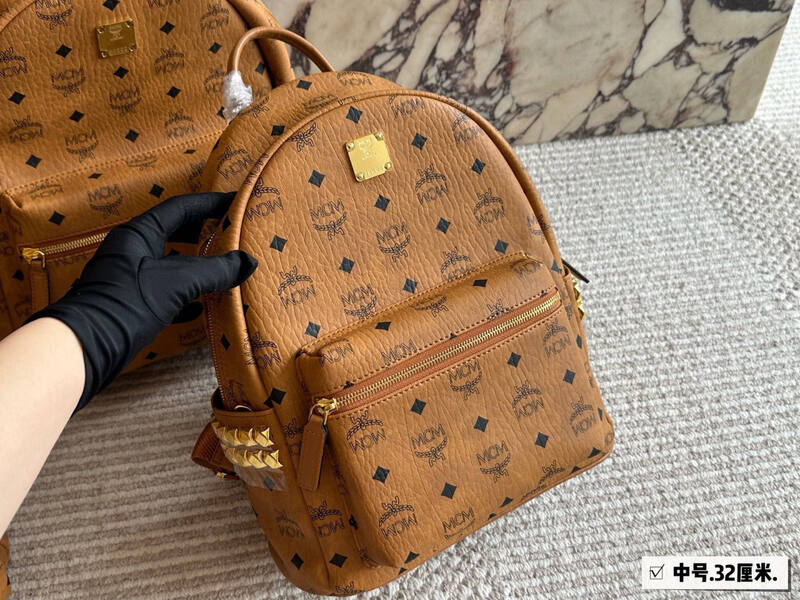MCM Stark Cognac Visetos (small) backpack — AAA Quality Replica