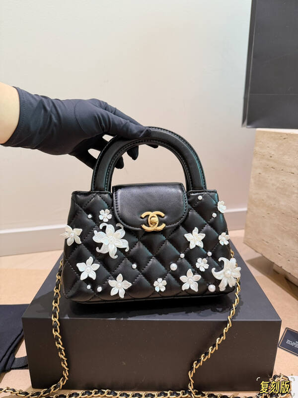 Chanel Kelly Black quilted leather with pearl floral embellishment top handle — Premium Replica